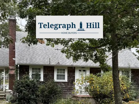 The house Frank sold, with a Telegraph Hill sign