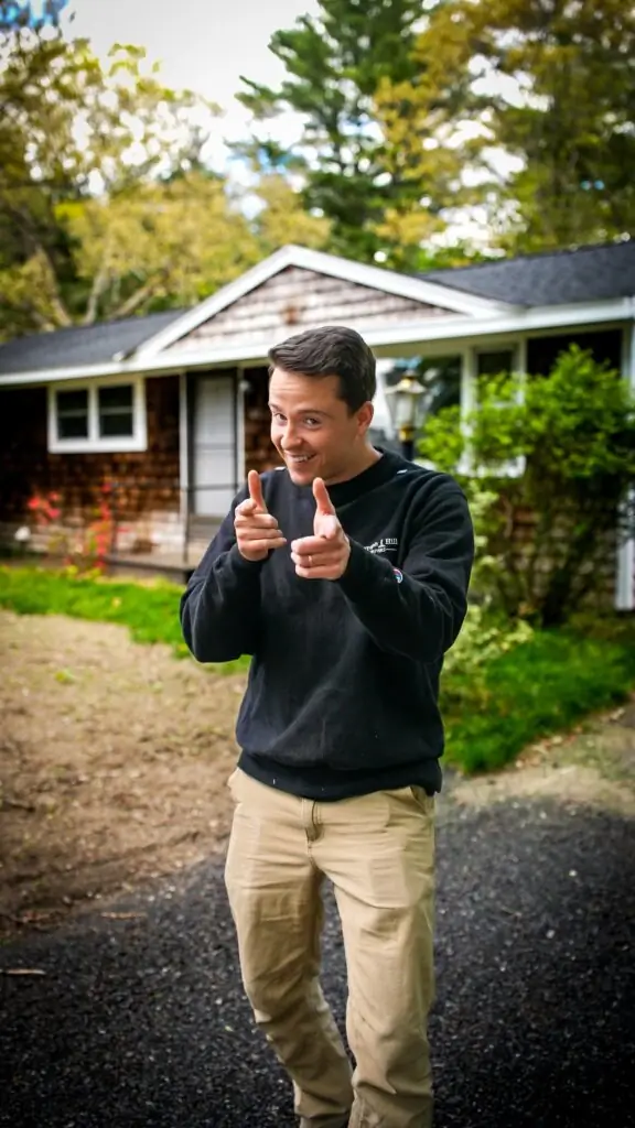 Ben walking up to a house